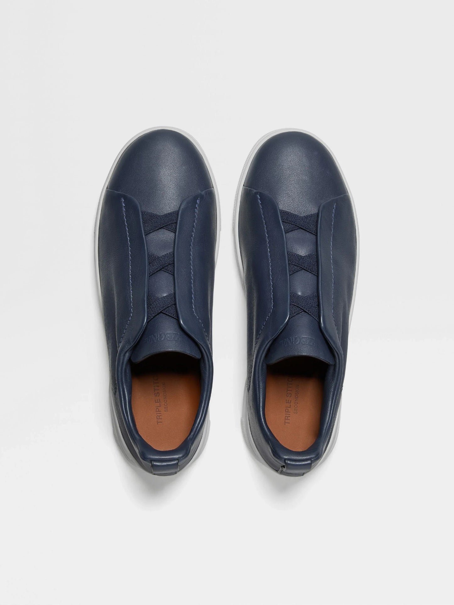 Triple stitch navy blue/white sole