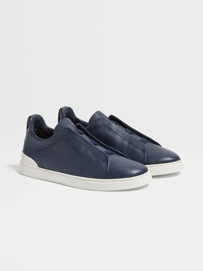 Triple stitch navy blue/white sole