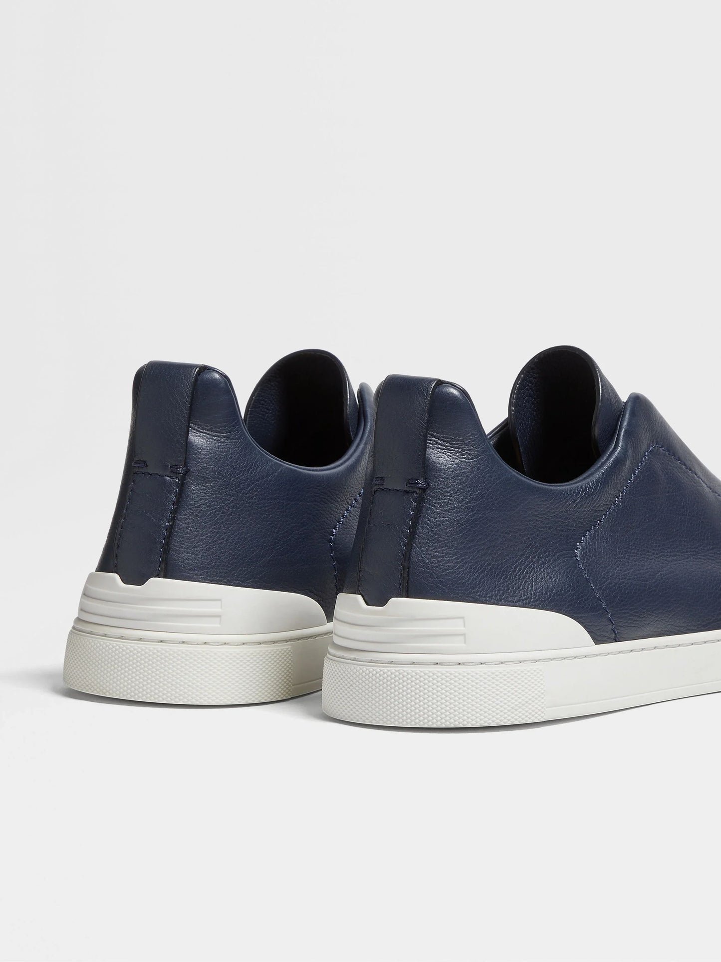 Triple stitch navy blue/white sole